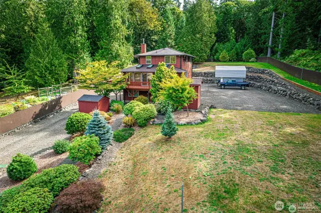 Amazing properties check out the attached details and videos. You are looking east at the buildings. The vacant lot is to the right (south). All the views are looking out to the west (behind you) at the Hood Canal, Olympic Peninsula and Mountains.