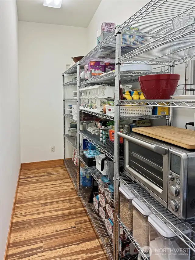 Walk in pantry off kitchen. Perfect size to build out.