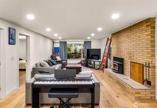 Recessed lighting and clean lines enhance this versatile living space.
