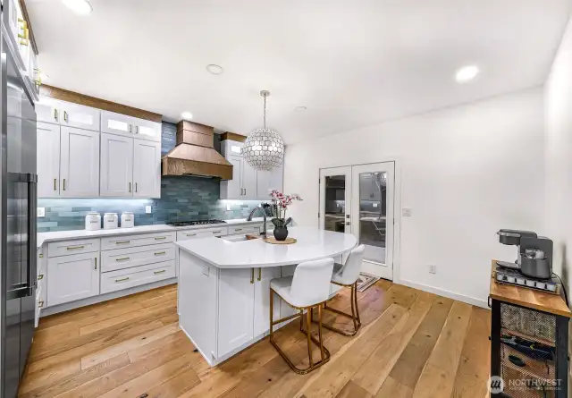 Kitchen island and organic textures create a cohesive and inviting space for everyday living.