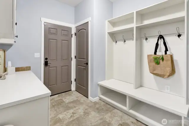 Lots of storage space in the mudroom. It's placement between the garage and the kitchen makes bringing in groceries easy!