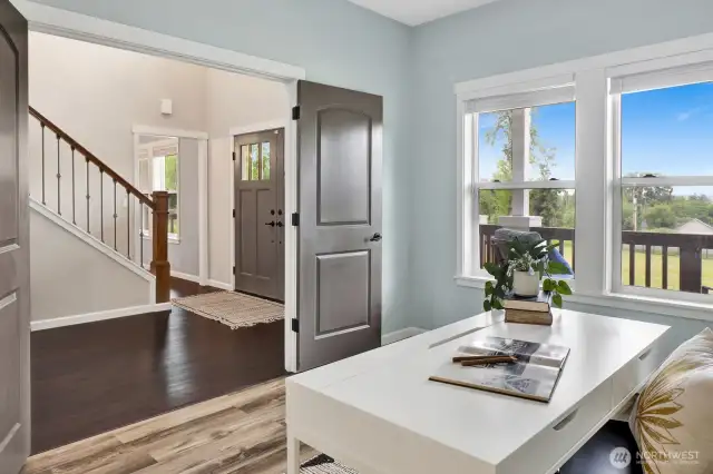 Double doors to the office with a view of the front entryway