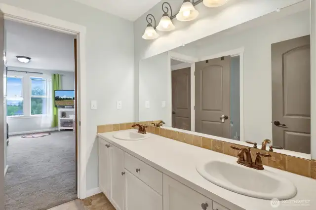 This full bathroom can be accessed by bedroom #2 and bedroom #3