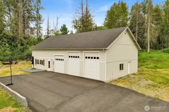 The shop is 2960 square feet and has a fuilly-permitted 1-bedroom ADU (with its own address), three bays, and an extra guest suite inside the shop