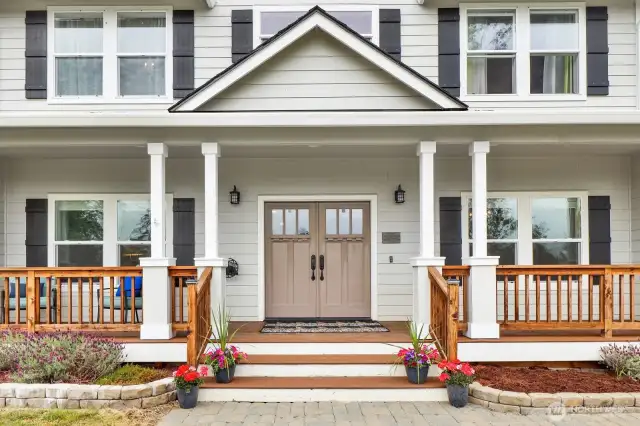 Greet your friends and family at the double-front doors and the spacious front porch