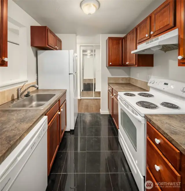 Entrance to unit on left is the remodeled galley kitchen