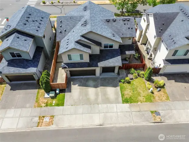 Fully fenced courtyard to the front door off the garage/driveway side of unit