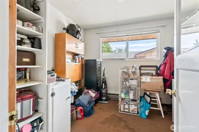 Office, pantry, or storage room with power. Located off breezeway.