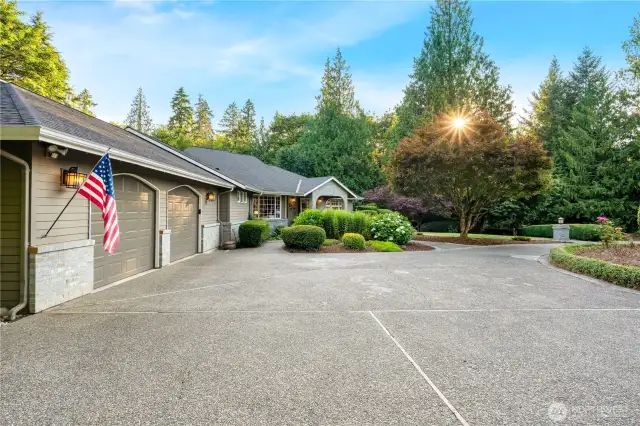 Oversized 2 car garage offers endless potential for storage, hobbies, or a home business on this spacious Maple Valley lot.