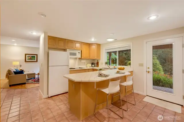 2nd kitchen on lower level with ample storage and counter space for ease and convenience in your Maple Valley home.