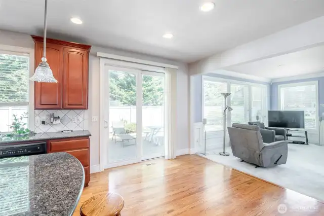 Kitchen nook and sliding glass door to the patio and rear yard.