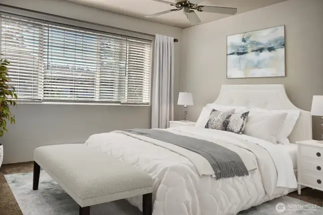 The Primary Bedroom is light and airy and you enjoy waking to morning sunshina and chirping birds. Vertually Staged.