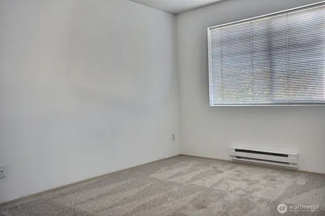 Second bedroom with 72 inch wind slider door closet space. Second floor is newly carpeted.
