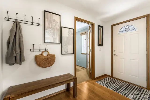A proper entry! The door to the guest room is there and the living room is on the opposite side of the hallway