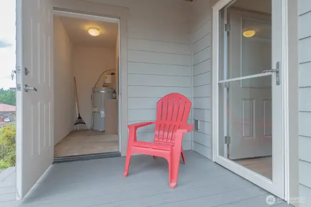 Covered back deck and Storage Room in back. Door into 2nd Bedroom.