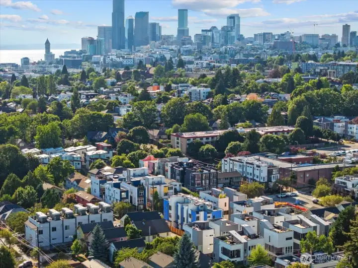 Perched just minutes from the city core, this community boasts proximity to downtown Seattle and sweeping skyline views.