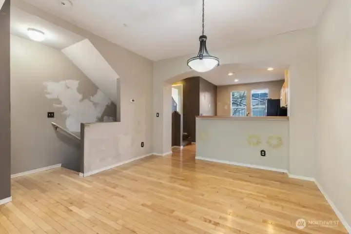 Looking towards the kitchen and the entry stairs.