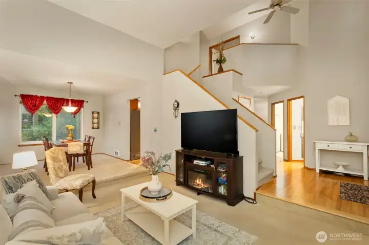 Living room and formal dining to the left as you enter the home.