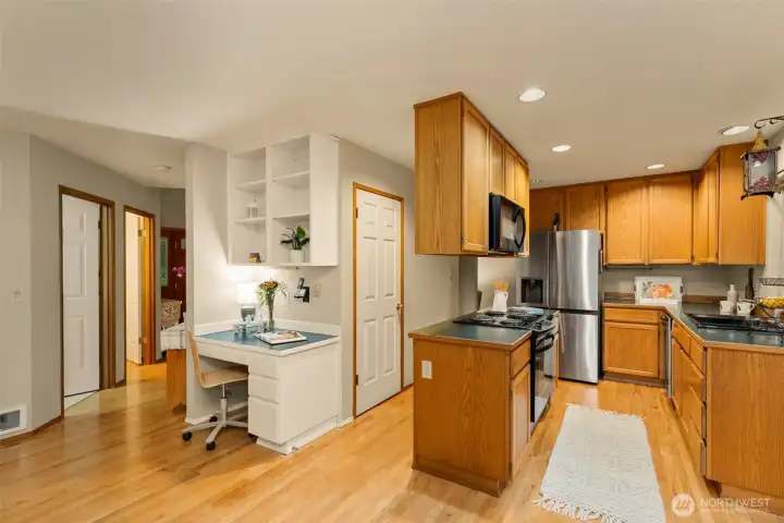 Kitchen with beautiful oak hardwood floors.