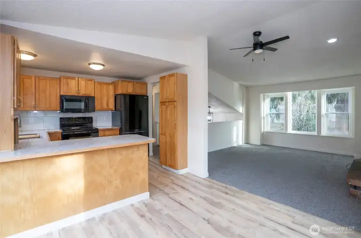 Seamless flow from dining into the living and kitchen areas.