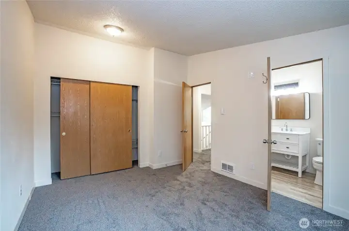 Primary suite captured from a different perspective.