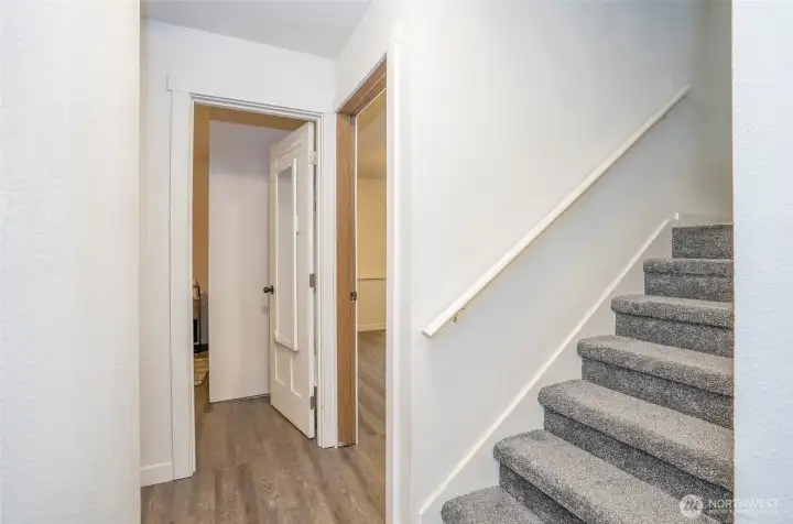 Lower-level landing with a view toward the two guest suites.