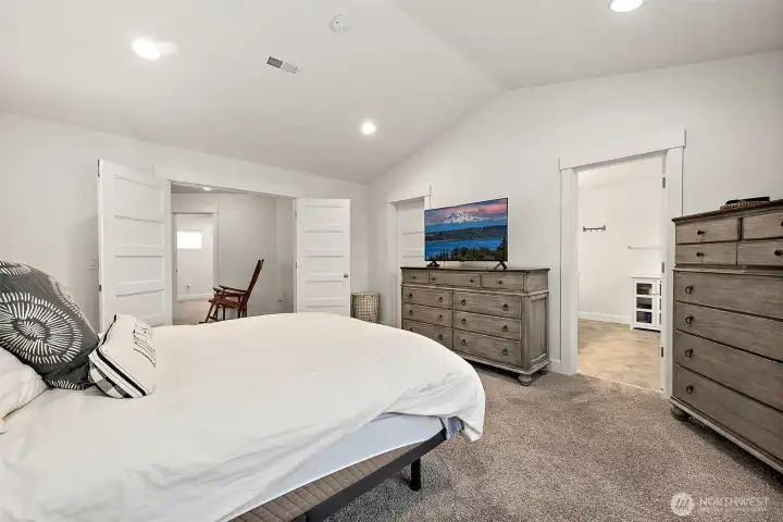 The primary bedroom has those gorgeous french doors.  It's just a lovely room!