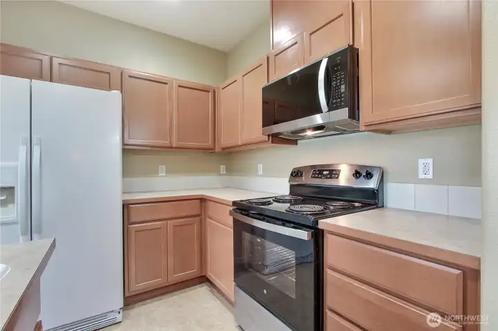 A dishwasher is located in the island.