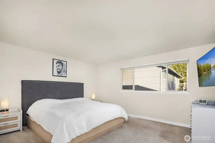 Primary bedroom with ensuite and walk in closet.