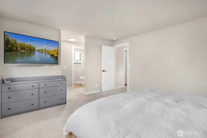 Primary bedroom with ensuite & walk in closet.