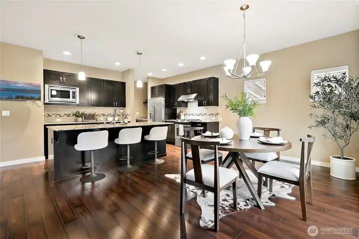 Open dining space connecting seamlessly into the kitchen space.
