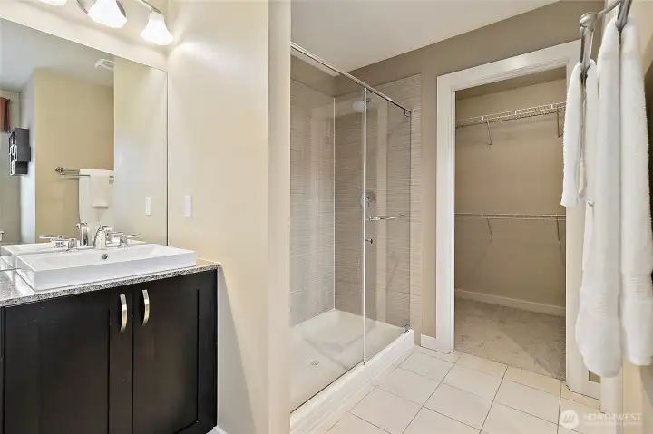 Primary bathroom includes a walk-in closet.