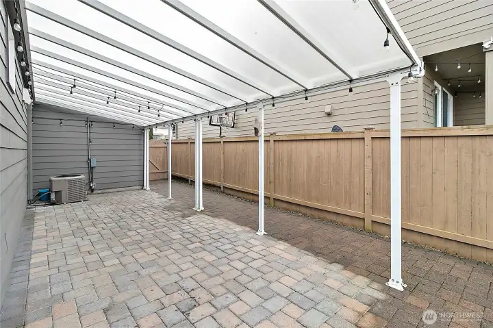 Patio awning equipped with lights on a day/night timer.
