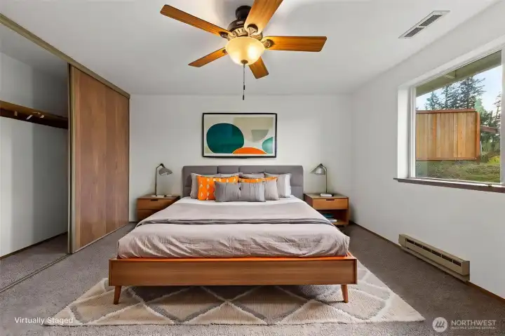 Spacious primary bedroom with large closet