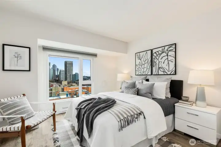 Large bedroom fit for a king size bed and the views shine day and night. A/C ports added in both bedroom and living room; 2 portable A/C units included.