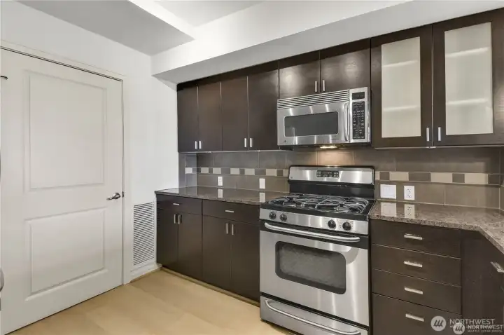 This kitchen blends luxury finishes with everyday practicality.