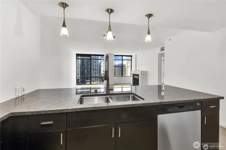 A combination of track and pendant lighting brightens the space.