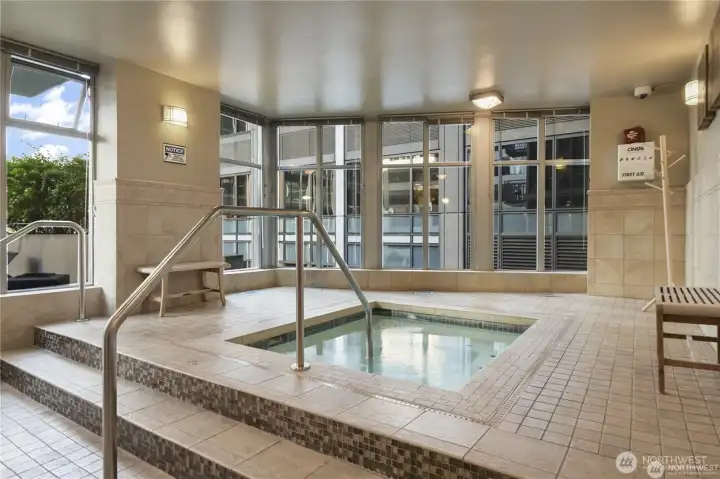 Sauna & Steam: To the left, a cedar-lined sauna provides additional spa-quality wellness right at home.