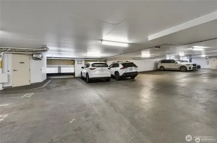 The garage is enclosed with controlled entry for safety and privacy, accessible only to residents and authorized guests. Assigned parking spot #223.
