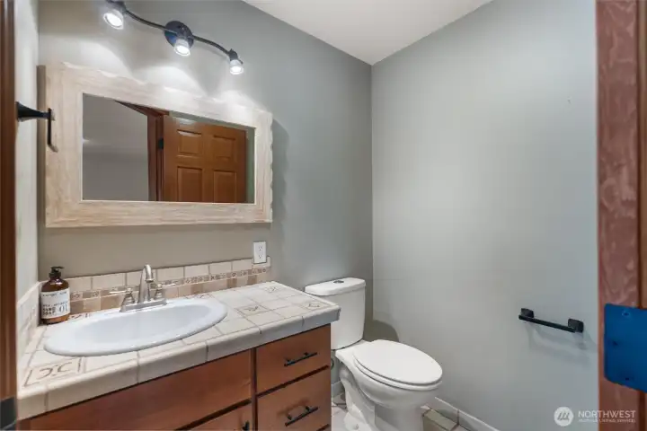 Conveniently located upper-level powder room for guests and everyday use