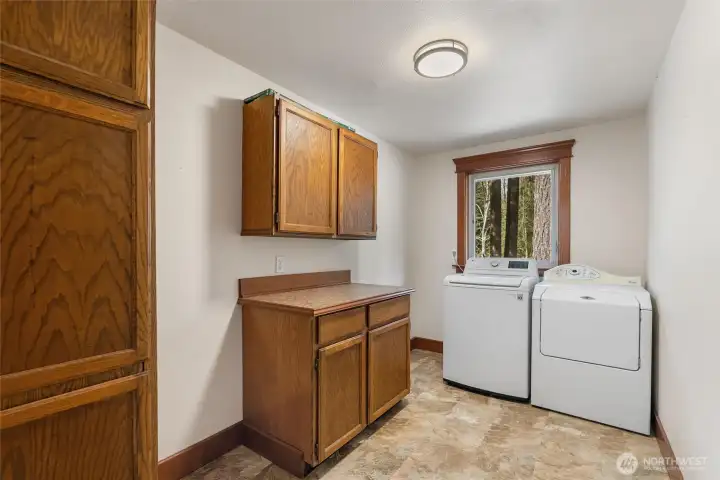 Make daily routines easier with this convenient upper-level laundry space