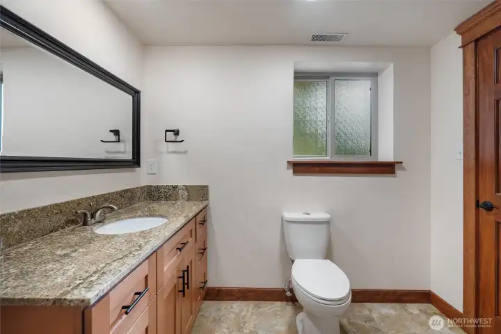 A convenient lower-level bathroom to support flexible living spaces