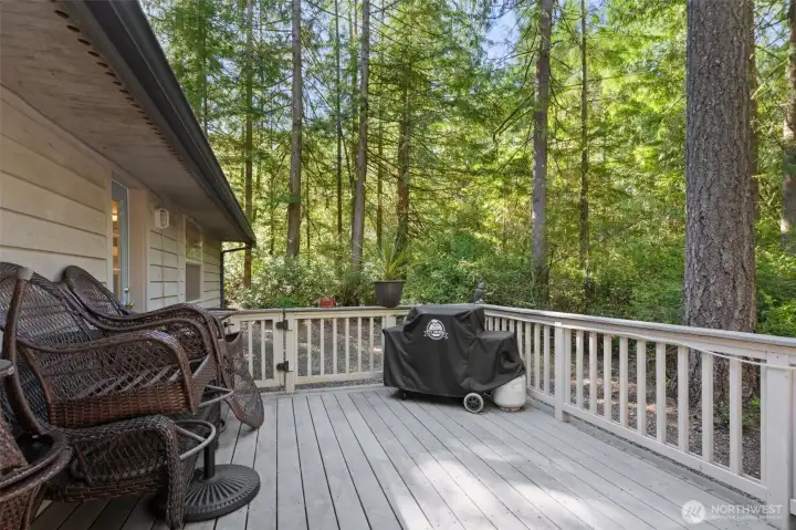 Private fenced deck off dining room also has door from office/craft room