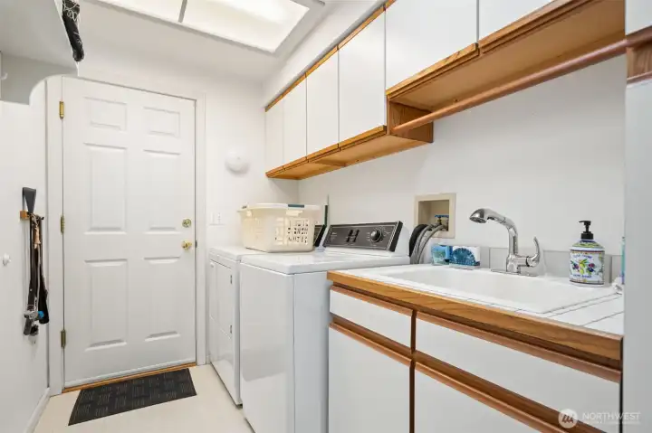 Laundry room w/door to garage.  Second door to garage from office/craft room