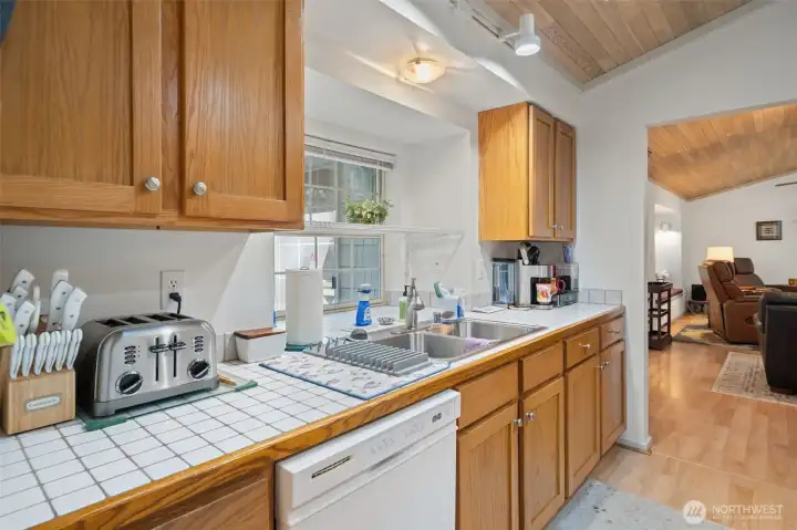 Kitchen with bay window toward living room