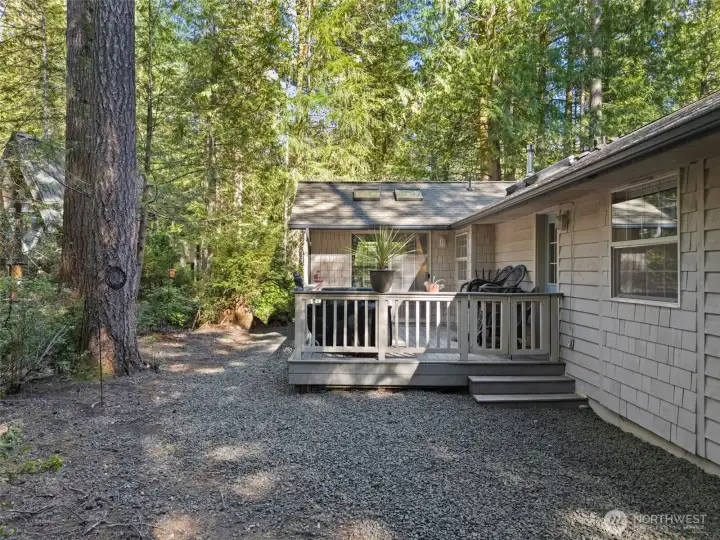 Private wooded back yard off fenced deck