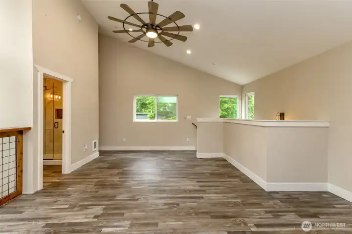 Loft area offers plenty of space for home gym, hobbies, and more