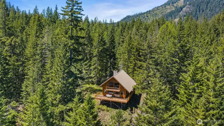 This property back 1 of the community lots,  130 acres for your very own backdoor adventure!