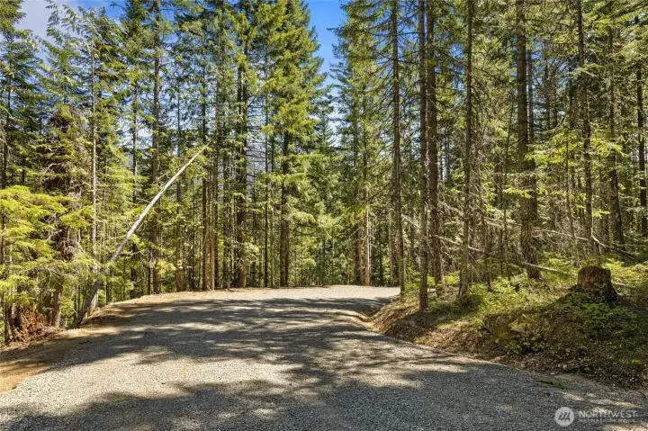 This gated entry leads to a private road accessing 3 homes for extreme privacy.