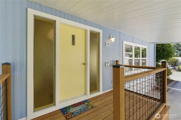 Cheerful front entrance with covered patio and Easy access stairs